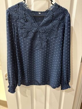 Elegant Navy Blue Women's Top
Balloon sleeve
NWOT worn once